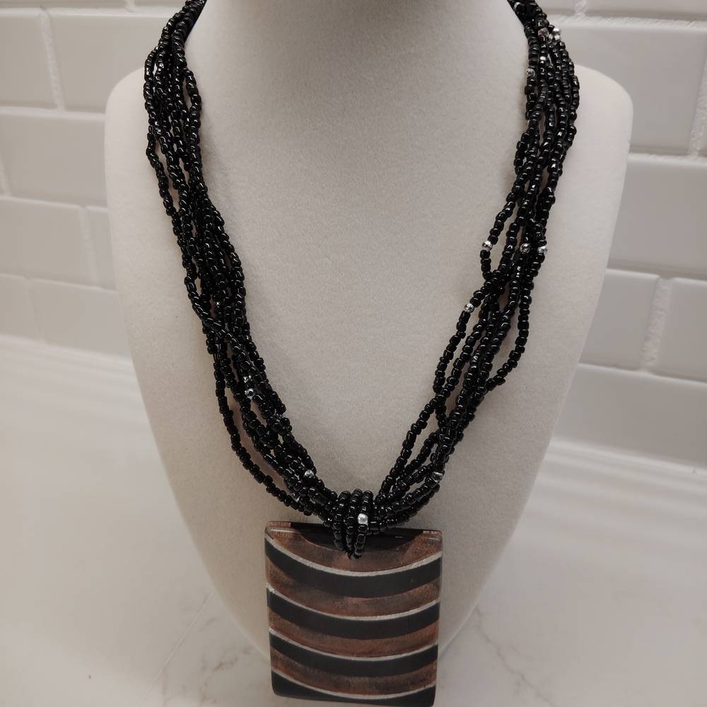 Black Seed Bead Necklace with Earthtone Striped Pendant